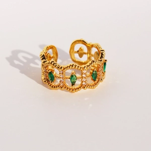 Vintage gold-plated brass lace ring featuring emerald green marquise zircons