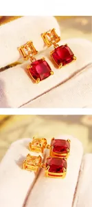 Détails des boucles d'oreilles rétro avec pierre rouge et zircon champagne sertis d'or