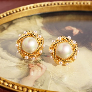 French vintage style large pearl stud earrings with twisted gold borders and small accents