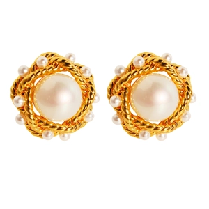 French vintage gold twist earrings featuring a large central pearl and small accents