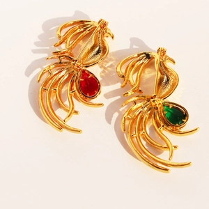 Elegant gold phoenix brooch with zircon peacock feathers and gemstone accents for coats