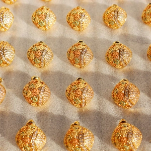 Hollow gold flower earrings with colorful enamel and sparkling zircon pavé