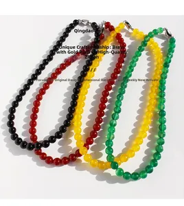 Detailed view of colorful agate bead necklaces with gold-plated brass clasps