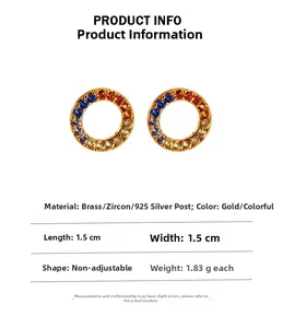 Detailed view of rainbow circle stud earrings in brass and silver with colorful zircons