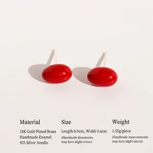 Red enamel oval stud earrings crafted with 925 silver pins and gold plated brass