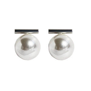 Minimalist silver bar stud earrings with large high-luster white pearls on white background
