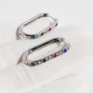 Elegant silver U-shaped earrings with double-sided pavé colored cubic zirconia stones