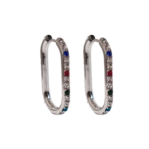 Elegant silver U-shaped hoop earrings with colorful zircon stones on a white background