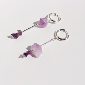 Handmade silver drop earrings featuring raw natural purple amethyst crystals and gemstones