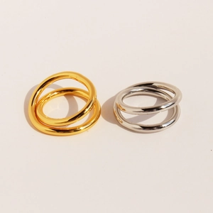Minimalist double-layer intertwined rings in polished gold and silver finishes