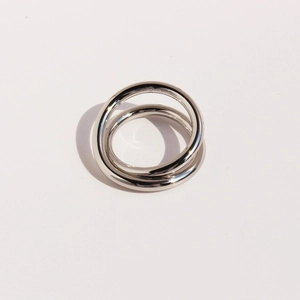 Minimalist double-layered crisscross ring with silver polished finish and geometric lines