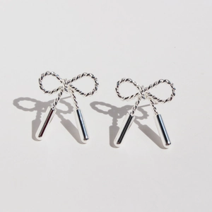 Polished silver bow stud earrings with twisted texture and cylindrical metal charms