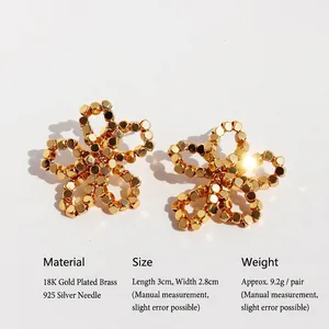 Golden woven flower earrings made of metallic cubes with 925 silver needles