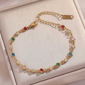 Gold stainless steel bracelet featuring colorful heart gems and adjustable lobster clasp