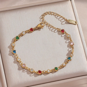 Elegant gold-tone stainless steel bracelet with colorful heart-shaped zirconia stones