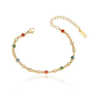 Macro shot of gold stainless steel bracelet with multi-colored heart-shaped zirconia stones