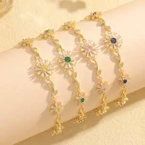 Elegant gold flower bracelet set with emerald green and colorful sunflower zircon links