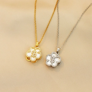 Titanium steel necklaces with gold and silver five-petal zircon flower pendants on satin