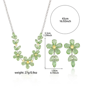 Women's jewelry set with green zircon flower necklace and matching earrings in silver finish
