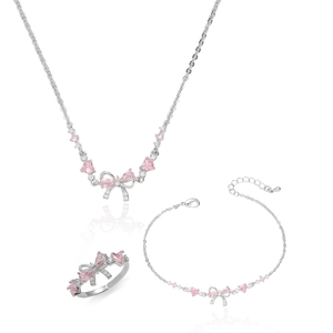 Parure de bijoux élégante avec pierres en cœur rose et nœuds avec collier et bracelet