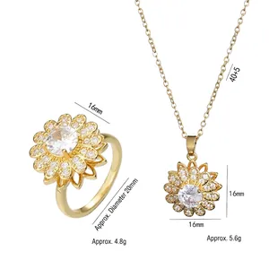 Golden sunflower jewelry set featuring a zircon necklace and matching ring on white background