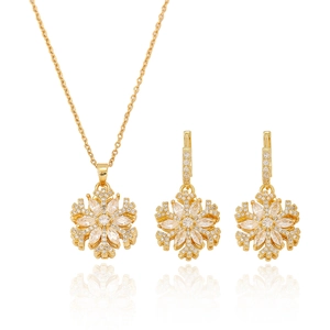 Parure de bijoux flocon de neige avec zircons sur collier doré et boucles d'oreilles
