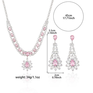 Elegant emerald-cut pink zircon necklace and drop earrings jewelry set on white background