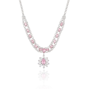 Elegant silver-toned floral necklace with pink pear-cut gemstones and sparkling crystals
