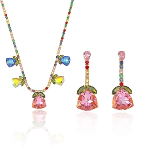 Luxuriöses Schmuckset in Gold mit bunten Kristallblumen und passenden Ohrringen