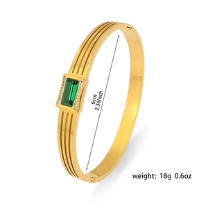 18K gold plated bangle for women featuring rectangular emerald stone and side clasp