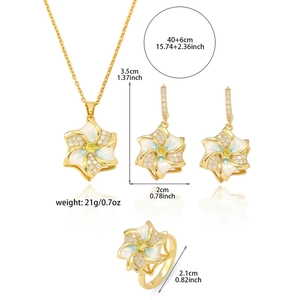 Detail of floral jewelry set with dimensions for necklace, earrings and ring size