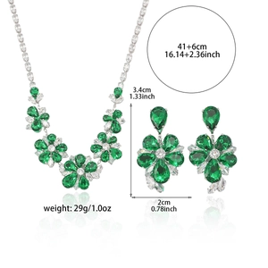 Emerald flower jewelry set with necklace and earrings featuring green cubic zirconia stones