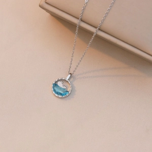 Elegant silver whale necklace with blue ocean wave gemstone pendant for women