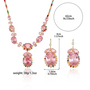 Fashion jewelry set with pink oval gemstones and colorful crystals on gold necklace