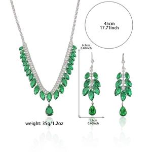 Elegant emerald green zircon necklace and tassel earrings set in polished silver finish