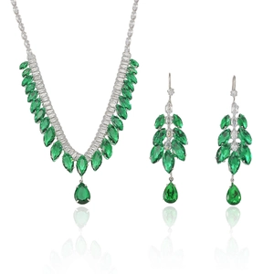 Elegant emerald jewelry set with necklace and drop earrings featuring zirconia tassels