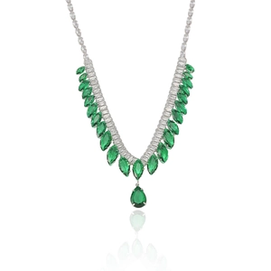 Silver necklace with green marquise zircon leaves and pear drop pendant on white background