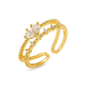 Close-up of golden adjustable open ring with pear-cut zircon and beaded texture detail