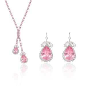Pink teardrop gemstone necklace and earring set with shimmering zircon accents on white