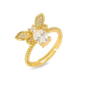 Detailansicht eines goldenen Schleifenrings mit Zirkonia und gedrehtem Design