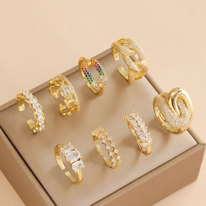 8-piece set of minimalist gold adjustable chain rings with colorful zircon inlays