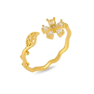 Close-up of golden flower ring with marquise zircon petals and leaf detail on wavy band