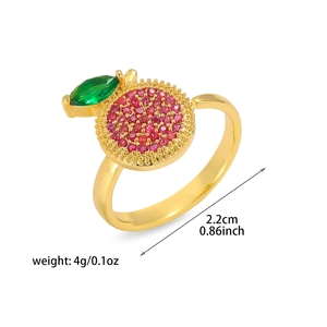 Detail of French cherry ring featuring red crystals and green leaf with size specs