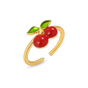 Adjustable gold twist ring featuring red cherry design in a polished French style finish