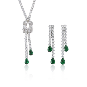 Elegant emerald green zircon necklace and earring set with pear-cut stones on white background