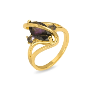 Detail of gold flower ring with marquise purple stone and side diamond accents