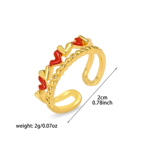 Detail of double-layer adjustable ring with red hearts and pavé cubic zirconia