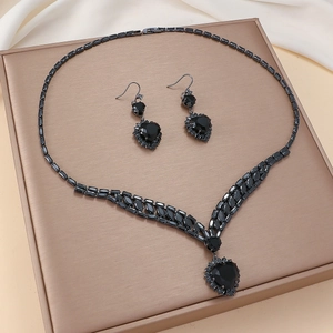 Elegant black heart jewelry set with zircon necklace and matching dangle earrings