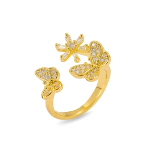 Detail of adjustable gold ring with micro-pave butterfly and flower crystal charms