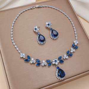 Blue drop pendant necklace and earrings jewelry set with floral zircon stones